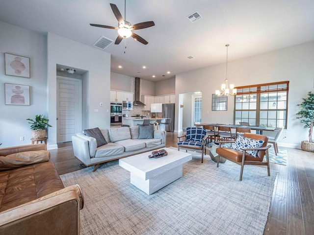 114 Loysoya St, Bastrop, TX 78602 - living area featuring a chandelier, a ceiling fan, recessed lighting, light wood-style floors, and baseboards