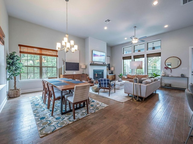 114 Loysoya St, Bastrop, TX 78602 - dining space featuring a ceiling fan, dark wood finished floors, a chandelier, and recessed lighting