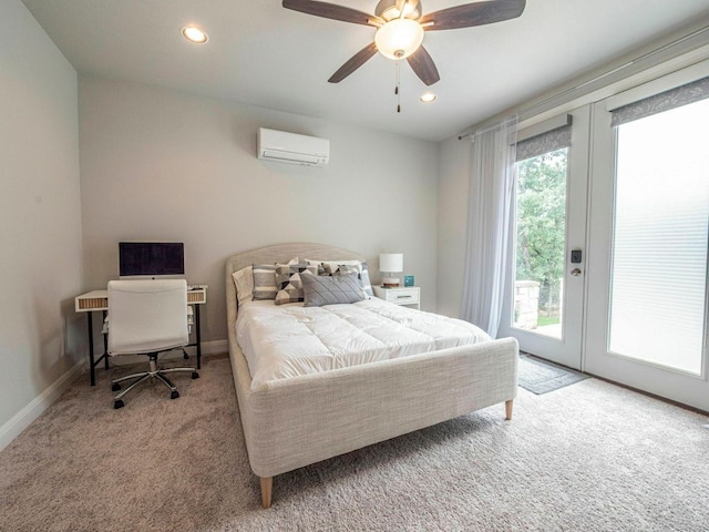 114 Loysoya St, Bastrop, TX 78602 - bedroom featuring an AC wall unit, access to outside, carpet, french doors, and a ceiling fan