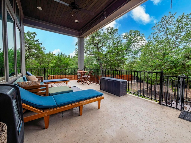 114 Loysoya St, Bastrop, TX 78602 - patio / terrace featuring a ceiling fan, view of wooded area, and outdoor lounge area