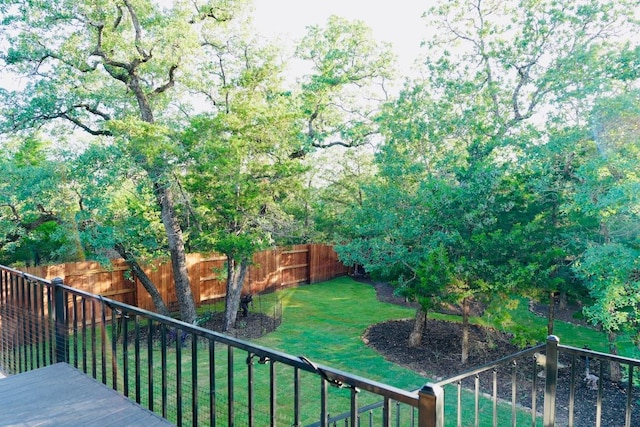 114 Loysoya St, Bastrop, TX 78602 - wooden terrace featuring a fenced backyard