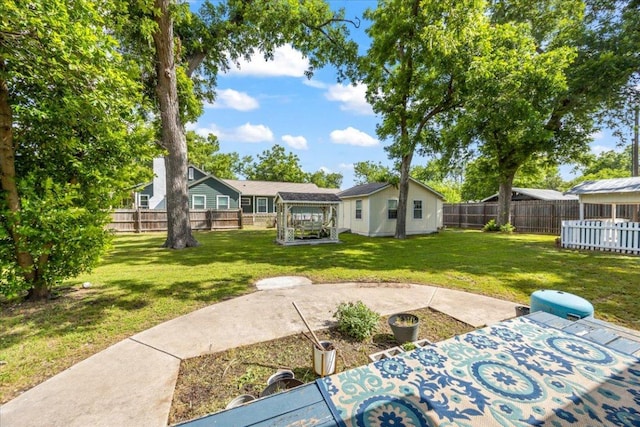 1223 Cecelia St, Taylor, TX 76574 - rear view of house with a patio