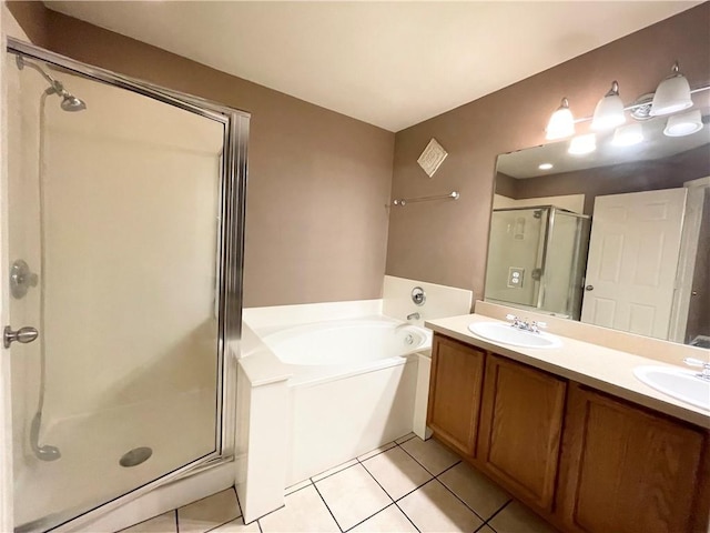 2210 Amy Lynn Ln, Cedar Park, TX 78613 - full bathroom with a shower stall, a garden tub, tile patterned flooring, and double vanity