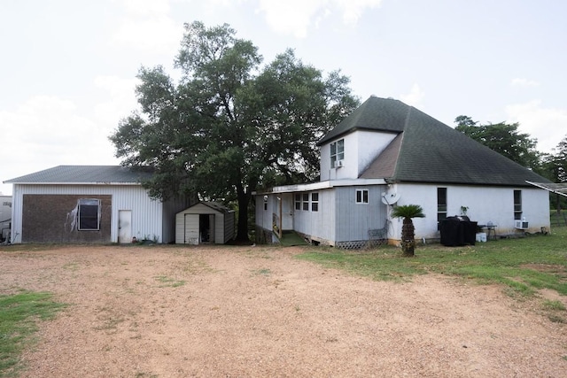 178 Ann Powell Rd, Smithville, TX 78957 - back of property with dirt driveway
