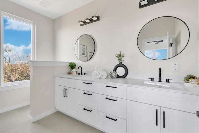 2309 Montopolis Dr Unit 8, Austin, TX 78741 - bathroom with double vanity and plenty of natural light