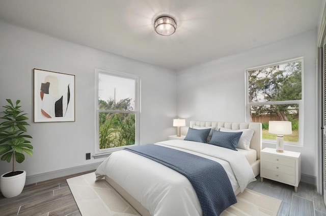 9600 Claxton Dr, Austin, TX 78736 - bedroom with wood finished floors and baseboards