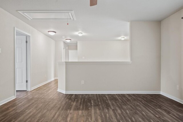 383 Spring Dr, Kyle, TX 78640 - unfurnished room with attic access and dark wood-type flooring