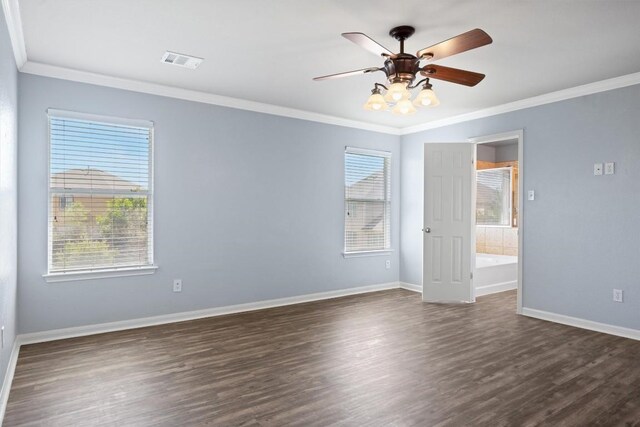 383 Spring Dr, Kyle, TX 78640 - unfurnished room with dark wood-style flooring, crown molding, and ceiling fan