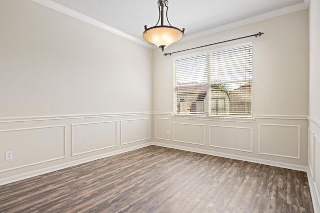 383 Spring Dr, Kyle, TX 78640 - empty room with ornamental molding, dark wood-style flooring, a decorative wall, and wainscoting
