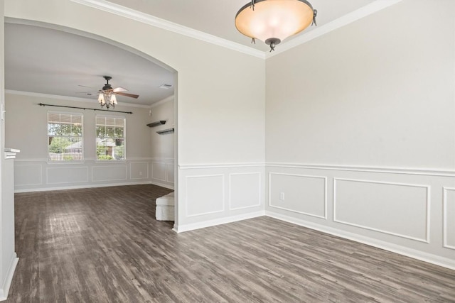 383 Spring Dr, Kyle, TX 78640 - unfurnished room featuring a ceiling fan, wood finished floors, ornamental molding, a decorative wall, and a wainscoted wall