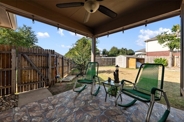 620 Allens Creek Way, Round Rock, TX 78664 - fenced backyard featuring a patio, a storage unit, and a ceiling fan