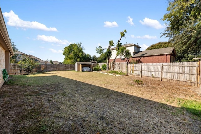 620 Allens Creek Way, Round Rock, TX 78664 - fenced backyard with a storage unit