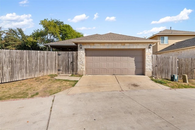 620 Allens Creek Way, Round Rock, TX 78664 - view of front of home featuring stone siding, concrete driveway, and a garage