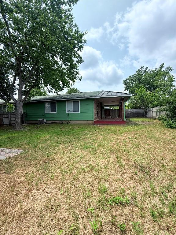 7707 Eastcrest Dr, Austin, TX 78752 - back of house featuring a standing seam roof