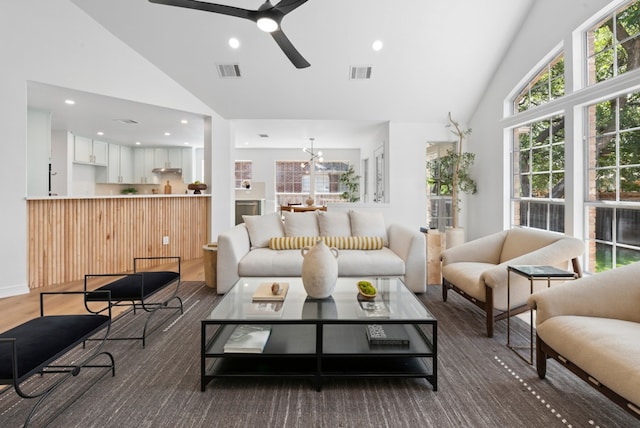 10021 Mirage Cv, Austin, TX 78717 - living room featuring a ceiling fan, high vaulted ceiling, recessed lighting, and a chandelier