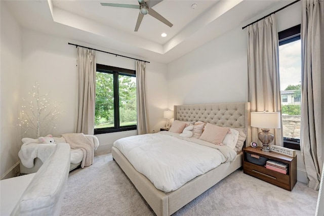 8100 Magnolia Ridge Cv, Austin, TX 78738 - bedroom with light carpet, a raised ceiling, recessed lighting, and ceiling fan