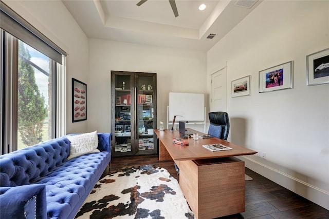 8100 Magnolia Ridge Cv, Austin, TX 78738 - office space featuring a raised ceiling, ceiling fan, dark wood-style floors, and baseboards