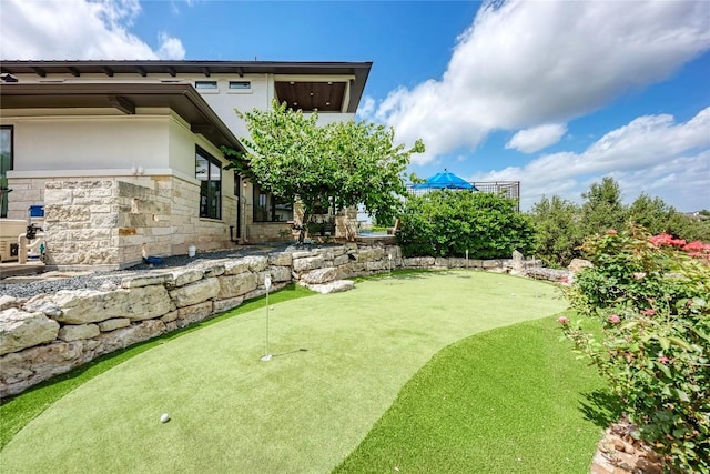 8100 Magnolia Ridge Cv, Austin, TX 78738 - view of yard with an area to practice putting
