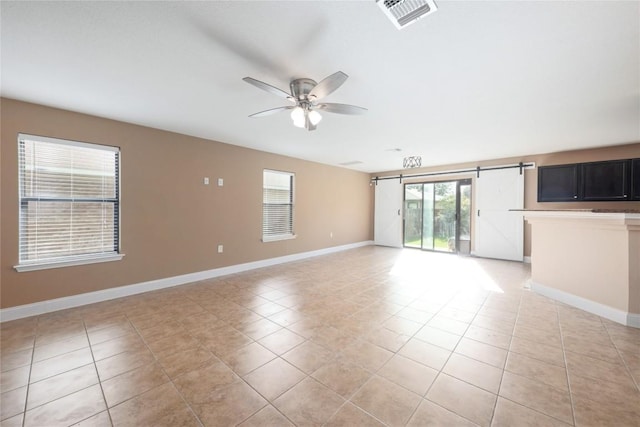 9001 Edmundsbury Dr, Austin, TX 78747 - unfurnished room featuring light tile patterned floors and a ceiling fan