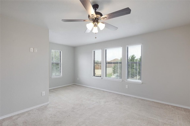 9001 Edmundsbury Dr, Austin, TX 78747 - unfurnished room featuring light colored carpet and a ceiling fan