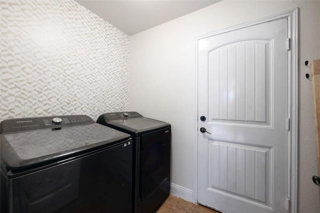 9001 Edmundsbury Dr, Austin, TX 78747 - laundry room featuring washing machine and clothes dryer and tile patterned flooring