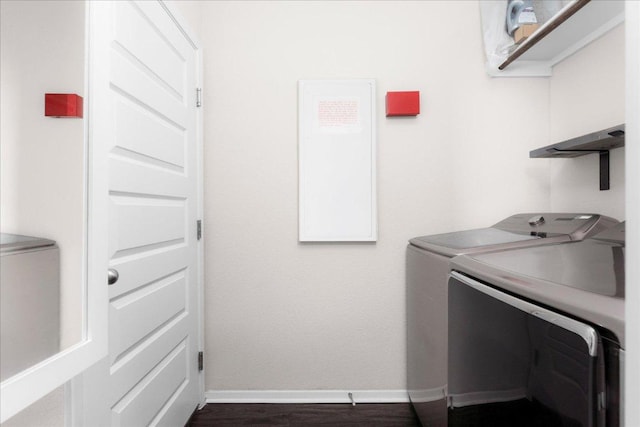 2800 Joe Dimaggio Blvd Unit 100, Round Rock, TX 78665 - washroom with washer and dryer and dark wood-style floors