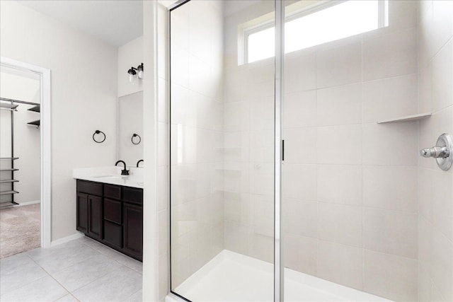 2800 Joe Dimaggio Blvd Unit 100, Round Rock, TX 78665 - full bathroom featuring a stall shower, vanity, and tile patterned floors