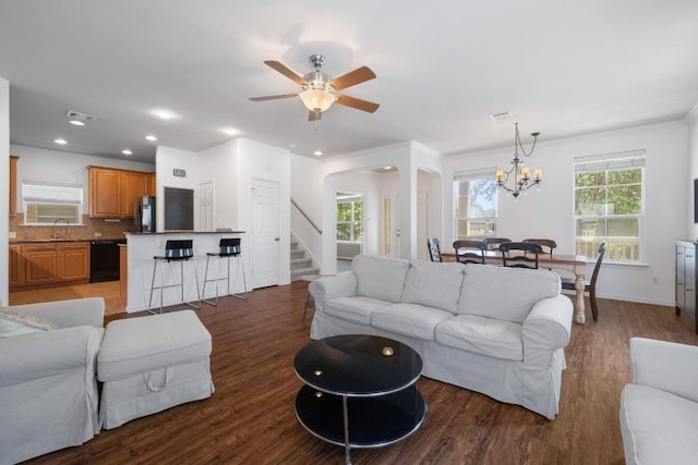 1813 Indian Lodge Dr, Cedar Park, TX 78613 - living area featuring a chandelier, ceiling fan, dark wood-style floors, stairs, and recessed lighting