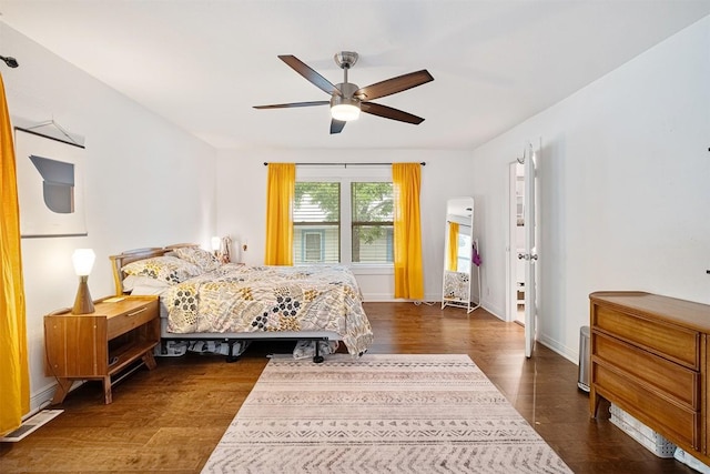 1003 E 13th St Unit 1, Austin, TX 78702 - bedroom featuring wood finished floors, baseboards, and ceiling fan