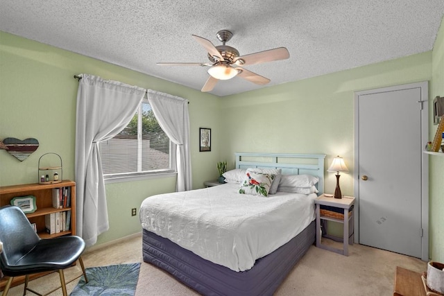 534 Broken Feather Trl, Pflugerville, TX 78660 - carpeted bedroom with ceiling fan and a textured ceiling