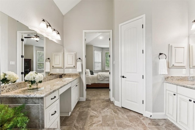 104 Blue Agave Ln, Georgetown, TX 78626 - bathroom with ceiling fan, vanity, lofted ceiling, ensuite bath, and baseboards