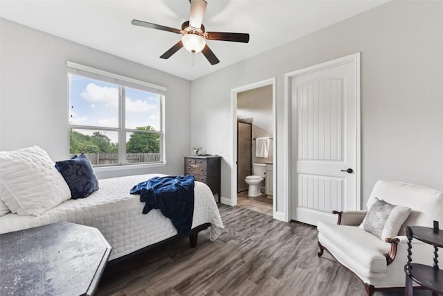 104 Blue Agave Ln, Georgetown, TX 78626 - bedroom featuring wood finished floors, ensuite bathroom, baseboards, and a ceiling fan