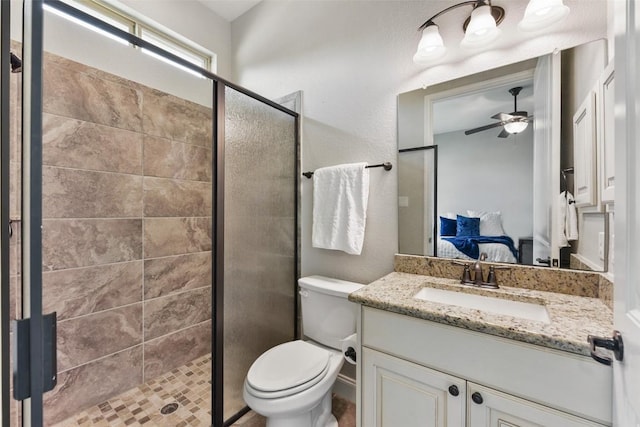 104 Blue Agave Ln, Georgetown, TX 78626 - full bath with ensuite bath, vanity, a stall shower, and a ceiling fan