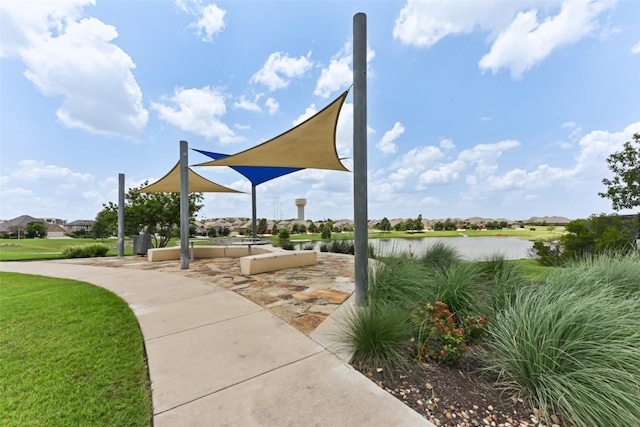 104 Blue Agave Ln, Georgetown, TX 78626 - surrounding community with a water view and a yard