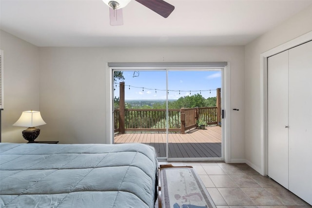 108 Highlander St, Lakeway, TX 78734 - tiled bedroom with access to outside and a ceiling fan