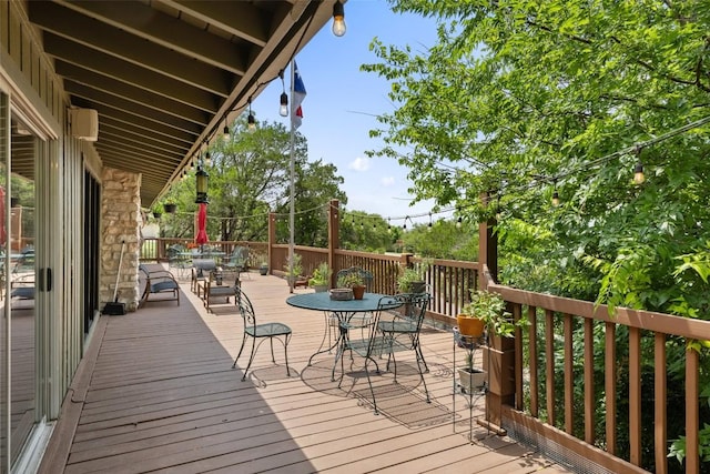 108 Highlander St, Lakeway, TX 78734 - wooden terrace with outdoor dining area