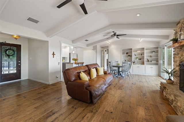 108 Highlander St, Lakeway, TX 78734 - living room with ceiling fan, wood-type flooring, and built in shelves