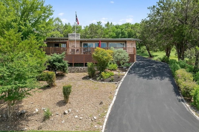 108 Highlander St, Lakeway, TX 78734 - view of front of home with a wooden deck