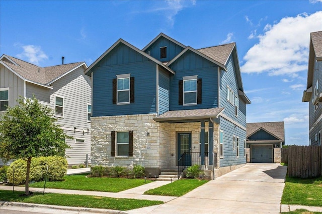 1725 Cobblecrest Ln, Leander, TX 78641 - craftsman-style home featuring board and batten siding, stone siding, driveway, and a garage