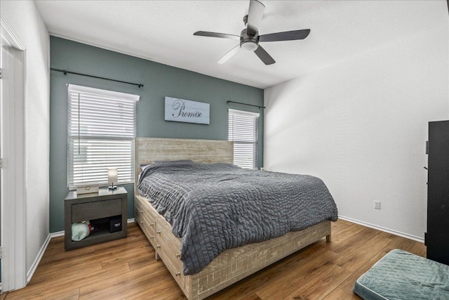 1725 Cobblecrest Ln, Leander, TX 78641 - bedroom featuring wood finished floors and a ceiling fan