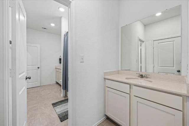 1725 Cobblecrest Ln, Leander, TX 78641 - bathroom featuring vanity and recessed lighting
