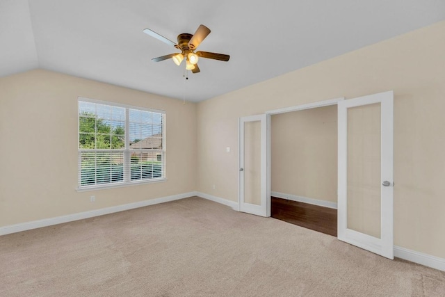 3546 Guadalajara St, Round Rock, TX 78665 - unfurnished bedroom with carpet flooring, a ceiling fan, vaulted ceiling, and french doors