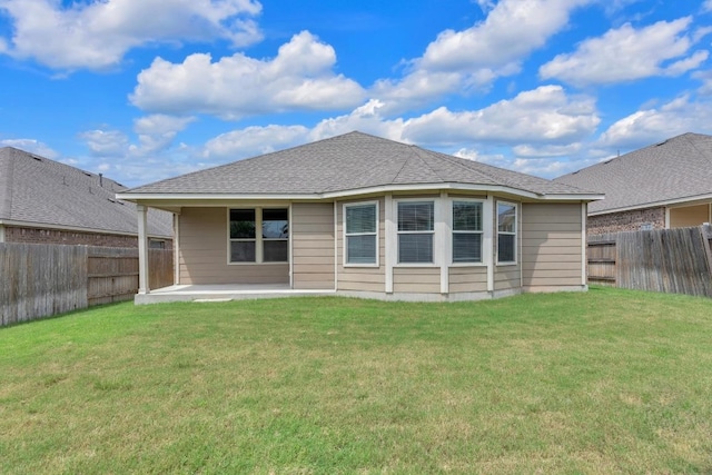 3546 Guadalajara St, Round Rock, TX 78665 - rear view of house featuring a patio area, a fenced backyard, and roof with shingles