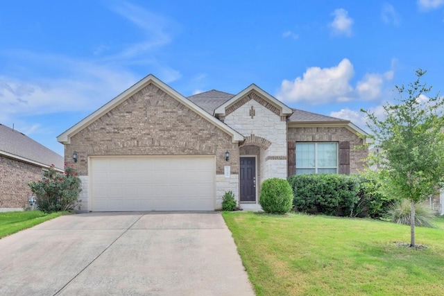 3546 Guadalajara St, Round Rock, TX 78665 - french country inspired facade featuring a front yard, driveway, an attached garage, stone siding, and brick siding