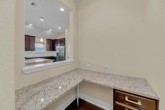 3546 Guadalajara St, Round Rock, TX 78665 - kitchen featuring stainless steel fridge with ice dispenser, dark wood-style flooring, dark brown cabinets, lofted ceiling, and recessed lighting