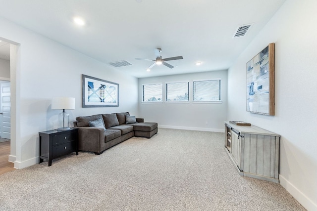 471 Diamondleaf Dr, Buda, TX 78610 - living room featuring light carpet, ceiling fan, and baseboards