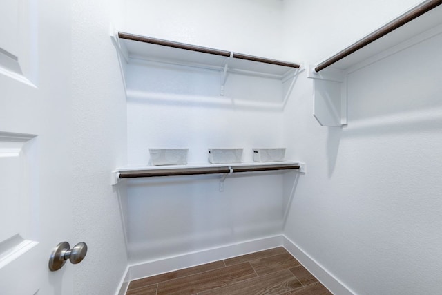 471 Diamondleaf Dr, Buda, TX 78610 - spacious closet with dark wood finished floors