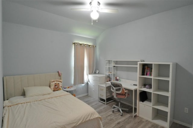 16805 Ruggio Rd, Pflugerville, TX 78660 - bedroom with wood finished floors, baseboards, lofted ceiling, and ceiling fan