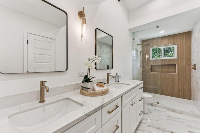 1111 Spearson Ln, Austin, TX 78745 - bathroom with tiled shower, double vanity, and marble finish flooring