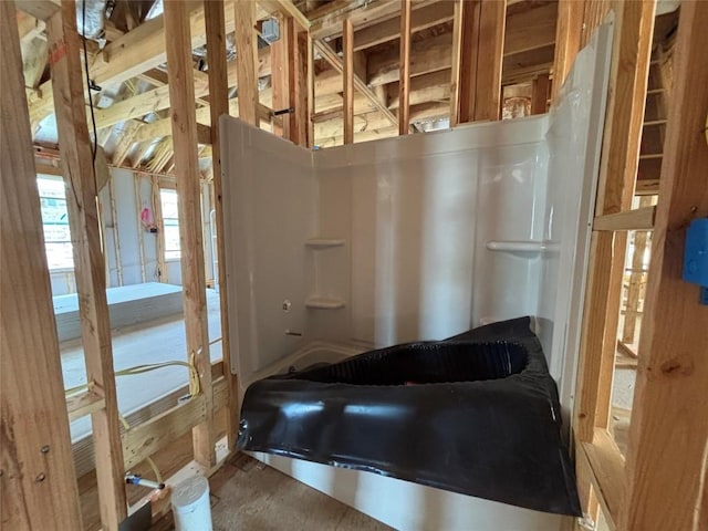 1309 Dog Iron St, Georgetown, TX 78633 - bathroom featuring a tub to relax in